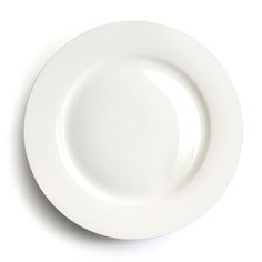 an empty white plate on a white background