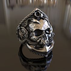 Presenting our intricately handcrafted Sunken Skull Pirate Anchor Themed 925 Sterling Silver Ring. This unique piece of jewelry is a tribute to the adventurous spirit of the sea, making it an ideal gift for sea lovers, pirate enthusiasts, or anyone who appreciates nautical history. The ring is made from 925 sterling silver, known for its durability and timeless appeal. It features a detailed sunken skull and pirate anchor, symbols of adventure and mystery, making it a conversation starter wherev Pirate Anchor, Gothic Stuff, Skull Pirate, Viking Ring, Masonic Ring, Sea Lover, Retro Ring, Nautical Jewelry, Animal Rings