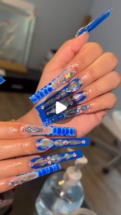 𝓓𝓮𝓼𝓼 𝓣𝓱𝓮𝓮 𝓝𝓪𝓲𝓵 𝓐𝓻𝓽𝓲𝓼𝓽🎀 on Instagram: "Fly shit only😮‍💨

@bluestreakcrystals DC: DESS💎 

#dallasnails #dfwnailss #nailsofinstagram #nailsofig #nailsofinsta #nailsart #nailsdesign #nailsinspo #oakcliffnails #nails #explore #explorepage #bluenails #blingedoutnails #explorepage✨ #nails💅" Artist On Instagram, Blue Nails, Charms, On Instagram