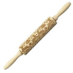 a wooden rolling pin with ornate designs on it