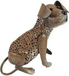 a metal dog figurine sitting on its hind legs