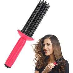 a woman is holding a hair dryer in her hand and it's brush