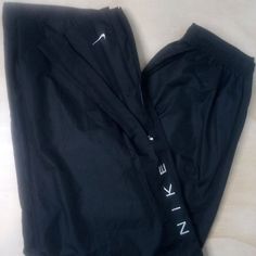 Vintage Nike Spell Out Wind Pants Joggers Trainers, Side Pockets, Zippers At Ankles, No Lining - Size Large, Measures Adjustable Drawstring Elastic Waist(Flat)=14" Inseam=32" Front Rise=14" - Excellent Condition, No Flaws - Black Color Pants Color Pants, Nike Vintage, Colored Pants, Vintage Nike, Jogging, Black Color, Favorite Outfit, Gender Neutral, Elastic Waist