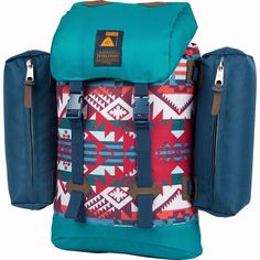 a blue backpack with red, white and green designs on the front is sitting against a white background