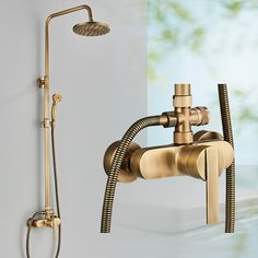 an image of a bathroom setting with shower head and hand shower faucet set