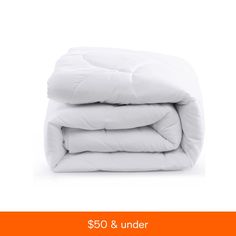 two white pillows stacked on top of each other with the text $ 50 & under