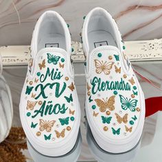 Beautiful customer vans with butterflies. All designs handmade and embellished with a variety of high quality crystals. Good for birthdays, wedding, or other special occasion, these are sure to get attention. Designs and Texts *You can choose one of our texts in the personalization section or message us with your own words. *If you want a different Color of shoes message me and I will try my best to get them for you. (NEW SHOES GUARANTEED) *Orders are processed and shipped within** 2-3 weeks  NO 15 Shoes Quinceanera Vans, Custom Quince Shoes Vans, Quinceanera Shoes Sneakers Green, Custom Quince Shoes, Quince Shoes Heels, Quinceanera Shoes Sneakers, Quince Shoes Sneakers, Quince Ideas Themes, Xv Shoes