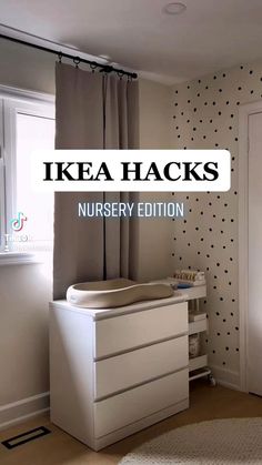 an ikea hacks nursery room with polka dot wallpaper