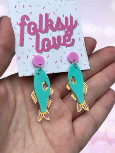 Handmade, laser cut acrylic earrings on nickel free posts. Glowforge Earrings Acrylic, Laser Cut Acrylic Ideas, Iridescent Fish, Acrylic Earrings Laser Cut, Fish Acrylic, Laser Cut Earrings Acrylics, Diy Props, Laser Cut Wood Crafts, Laser Cut Jewelry