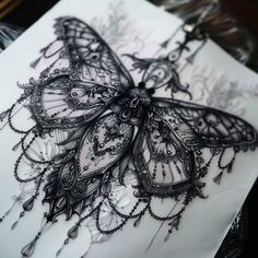 a drawing of a butterfly with intricate details