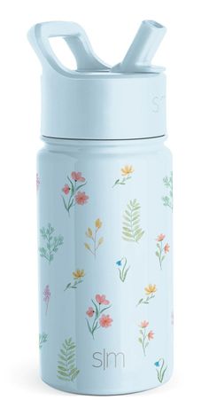 a blue and white water bottle with flowers on it