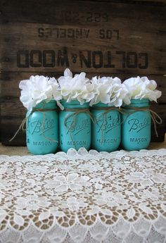 mason jars painted mason jars, rustic wedding centerpieces in blue with white flowers