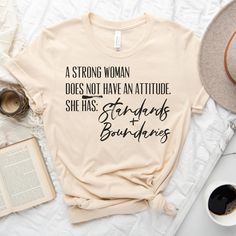 A Strong Woman Does Not Have Attitude She Has Standards and Boundaries | Women's T-Shirt | Women's Clothes | Cute Women's Tee  This t-shirt is everything you've dreamed of and more. It feels soft and lightweight, with the right amount of stretch. It's comfortable and flattering for all.  * 100% combed and ring-spun cotton (Heather colors contain polyester) * Ash color is 99% combed and ring-spun cotton, 1% polyester * Heather colors are 52% combed and ring-spun cotton, 48% polyester * Athletic a A Strong Woman, Cute Shirt Designs, Vinyl Shirts, Strong Woman, Diy Shirt, T Shirts With Sayings, Christian Clothing, Cute Woman, Shirts With Sayings