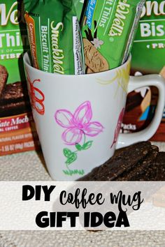 coffee mug filled with cookies and chocolate bars