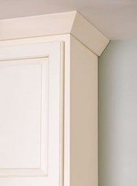 a close up of a white cabinet door