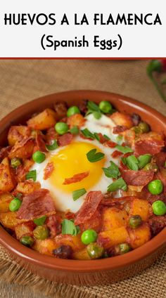 a bowl filled with eggs and peas on top of a table