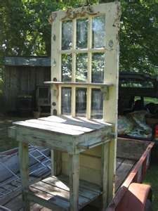 an old wooden desk sitting in the back of a truck