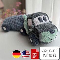 a crochet pattern for a stuffed animal that is laying on the table next to an american flag