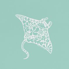 a drawing of a manta ray on a light blue background with the word love written in it