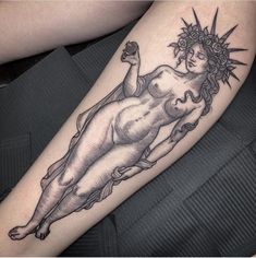 a woman's arm with a tattoo on it that has an image of the birth of venus