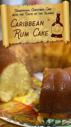 a bundt cake on a plate with a bottle of rum in the back ground