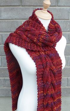 "This beautiful hand knitted scarf is made with Super Bulky and Soft Wool Blend Yarn (80% Acrylic, 20% Lambswool). Classic cable pattern The scarf can be worn in multiple ways. Very beautiful colors: shades of wine red, olive green, yellow, and blue. It is hard to show them in a picture. There is NO bright blue color in the scarf, just medium blue. The colors may appear slightly different on different monitors. Measures: 67\" (170 cm) long x 7\" (18 cm) wide. MORE COLORS are here: https://www.et Red Knitted Scarf For Fall, Red Knitted Fall Scarf, Red Knitted Fall Scarves, Red Hand Knitted Scarf One Size, Red Hand Knitted Scarves One Size, Red Yarn Knitting Pattern, Hand Knitted Red Yarn Knitting Pattern, Red Hand Knitted Yarn Knitting Pattern, Handmade Red Scarf For Fall