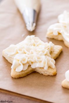 some cookies with icing on top of a table