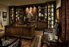 a living room filled with furniture and lots of bookshelves next to a window