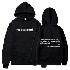 two black hoodies with the words you are enough written in white on each side