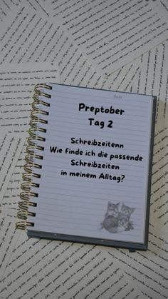 an open notebook with german text on it