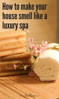 some soaps and flowers on a table with the words how to make your house smell like a luxury spa