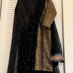 Black Chiffon Sharara With Poth Shirt Chiffon Stone Work Dupatta Very Elegant Dress Black Long Sleeve Georgette Dress, Anarkali Black Silk Dupatta, Black Silk Anarkali Dupatta, Black Silk Dress With Sheer Sleeves, Black Evening Dress With Dupatta, Chic Black Wedding Sets, Black Georgette Dress For Festive Occasions, Elegant Black Georgette Set, Black Dress With Sheer Dupatta And Traditional Drape