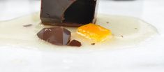 there is a piece of chocolate on the plate