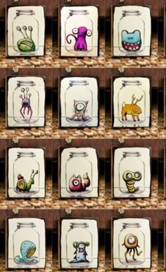 several glass jars filled with different types of cartoon characters and numbers on them, all lined up in the same row