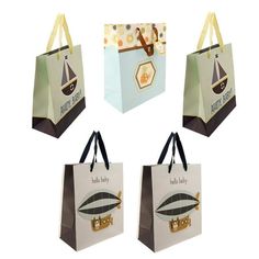 four paper bags with different designs on them