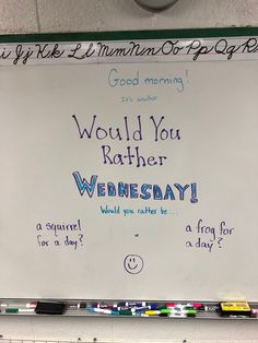 a white board with writing on it that says would you rather wednesday?