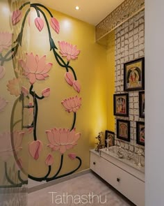 this is an image of a room with flowers on the wall and paintings on the walls