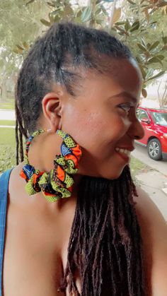 Oh so Dope yellow and orange ankara African fabric Hoop earrings.   *Please Note* these are handmade items; therefore, there may be slight shape variations. Winter Reference, Fabric Hoop Earrings, Fringe Earrings Diy, Ankara Accessories, Ankara Earrings, Upcycle Sewing, Sugar Land, Fabric Earrings, Earrings Diy