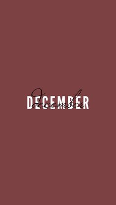 the word december is written in black ink on a maroon background with a red border