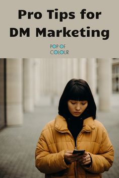 a woman looking at her cell phone with the text pro tips for dm marketing