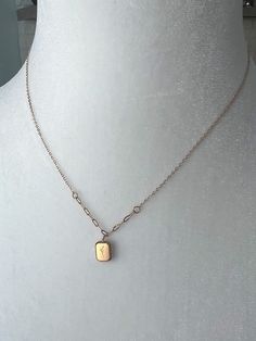 Introducing our Dainty French Lavender Charm Pendant Necklace - where minimalism meets everlasting love and nature's beauty. Embrace the elegance of simplicity with our Dainty French Lavender Charm Pendant Necklace, available in both radiant gold and timeless silver. This minimalist masterpiece carries a tiny, yet profound "Forever Love" engraving on one side of the beveled gold tag pendant, while the other side features an exquisite, handcrafted piece of lavender. It's perfect for plant lovers and those who cherish life's simple pleasures. Suspended from an 18-inch adjustable gold-plated or silver-plated stainless steel chain, thoughtfully crafted with a combination of cable and paperclip chain, this necklace is as unique as it is captivating. Hypoallergenic and resistant to tarnishing or Lady Necklace, Cherish Life, Gold Tag, Love Pendant, French Lavender, Necklace Minimalist, Charm Pendant Necklace, Everlasting Love, Plant Lady