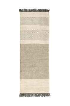 a beige and black rug with fringes on it's sides, against a white background