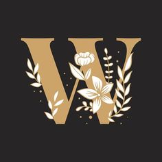 the letter w is decorated with flowers and leaves in gold on a black background,