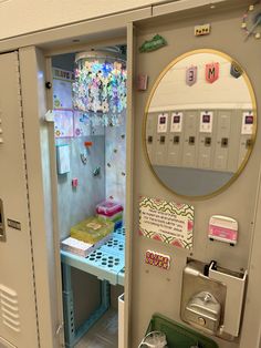 a locker with many items inside of it and a mirror on the wall next to it