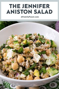 a white bowl filled with rice and vegetables