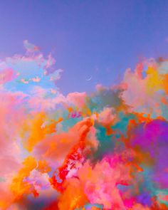 the sky is full of colorful clouds and blue skies with pink, orange, yellow, and green colors