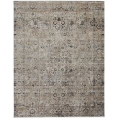 an area rug with various colors and patterns