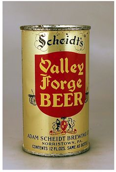 an old style beer can with the word's name in red and yellow on it