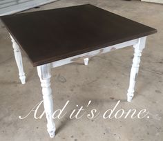 a white and brown table with the words add it's done on top in front of it