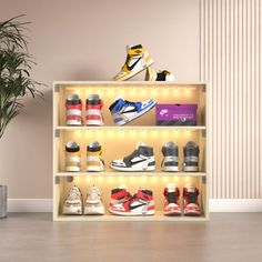 there are many pairs of shoes on the shelf